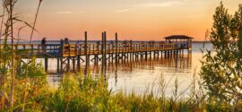 Retiring in Wilmington NC Guidebook picture of dock at sunset
